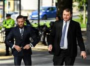 11 October 2019; Conor McGregor, left, arrives at The Criminal Courts of Justice in Dublin. Photo by Ramsey Cardy/Sportsfile