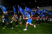 11 October 2019; Flagbearers from Cill Dara RFC with Joe Tomane of Leinster ahead of the Guinness PRO14 Round 3 match between Leinster and Edinburgh at the RDS Arena in Dublin. Photo by Ramsey Cardy/Sportsfile