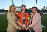 13 October 2019; Sean McManus of Bohemians is presented the Mark Farren Cup by Leanna Sheill of SSE Airtricity and Brigit Flannery, sister of Mark Farren, following the SSE Airtricity League - U17 Mark Farren Cup Final match between Kerry and Bohemians at Mounthawk Park in Tralee, Kerry. Photo by Harry Murphy/Sportsfile