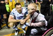 25 October 2019; Mascot Zoe Murphy with Dundalk captain Brian Gartland prior to the the SSE Airtricity League Premier Division match between Dundalk and St Patrick's Athletic at Oriel Park in Dundalk, Co Louth. Photo by Stephen McCarthy/Sportsfile