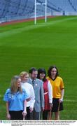 25 November 2003; Plans were unveiled at Croke Park to celebrate the cenrenary of Cumann Camogaiochta na nGael. At the announcement were Sean Kelly, President of the GAA with models wearing camogie apparel throughout the hundred years, from left, Fiona Munnelly, Brendan Quirke, Fiona Quirke and Mary Rose Ryan. Picture credit; Brendan Moran / SPORTSFILE *EDI*