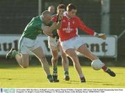 23 November 2003; Ken Darcy, St Brigid's, in action against Thomas O'Malley, Clonguish. AIB Leinster Club Football Championship Semi-Final, Clonguish v St. Brigid's, Cusack Park, Mullingar, Co. Westmeath. Picture credit; Brendan Moran / SPORTSFILE *EDI*