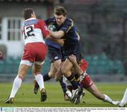 6 December 2003; John McWeeney, Leinster, in action against Biarritz's Marc Stcherbina (12) and Julien Peyrelongue. Heineken Cup, Pool 3, Round 1, Leinster Lions v Biarritz Olympique, Lansdowne Road, Dublin. Picture credit; Brendan Moran / SPORTSFILE *EDI*