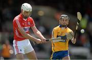 23 June 2013; John O'Callaghan, Cork, in action against Cathal O'Connell, Clare. Munster GAA Hurling Intermediate Championship, Semi-Final, Cork v Clare, Gaelic Grounds, Limerick. Picture credit: Brendan Moran / SPORTSFILE