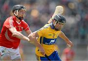 23 June 2013; Cathal Malone, Clare, in action against Tadhg Healy, Cork. Munster GAA Hurling Intermediate Championship, Semi-Final, Cork v Clare, Gaelic Grounds, Limerick. Picture credit: Brendan Moran / SPORTSFILE