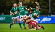 10 November 2019; Eimear Considine of Ireland is tackled by Alecs Donovan, left, and Paige Randall of Wales during the Women's Rugby International match between Ireland and Wales at the UCD Bowl in Dublin. Photo by David Fitzgerald/Sportsfile