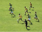 14 July 2019; Not for the first time in recent seasons Ryan McHugh leads the charge in a Donegal counter-attack. Where he goes, others follow. Here, McHugh’s team-mates Michael Langan, left, and Stephen McMenamin are running support lines while the Meath players racing to get back into position are, from left, Shane McEntee, Bryan Menton, Shane Walsh and James McEntee. And referee Conor Lane is right up with the break too. It’s Meath’s third defeat to Donegal this year but this is the most damaging. Photo by Daire Brennan/Sportsfile This image may be reproduced free of charge when used in conjunction with a review of the book &quot;A Season of Sundays 2019&quot;. All other usage © SPORTSFILE