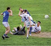 26 May 2019; Swinging a boot at it. Longford’s David McGivney watches Michael Quinn get his boot to the ball ahead of Kildare full back David Hyland to finish to the net in extra-time of a thrilling draw, with goalkeeper Mark Donnellan and Eoin Doyle powerless in a chaotic goalmouth. Photo by Ray McManus/Sportsfile. This image may be reproduced free of charge when used in conjunction with a review of the book &quot;A Season of Sundays 2019&quot;. All other usage © SPORTSFILE