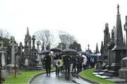 21 November 2019; Uachtarán Cumann Lúthchleas Gael John Horan, centre, with Monsignor Eoin Thynne, left, and Ard Stiúrthóir of the GAA Tom Ryan at the unveiling of headstones on the graves of Jerome O’Leary, 10, Michael Feery, 40, and Patrick O’Dowd, 57, who are among the 14 people killed at Croke Park on this day 99 years ago on what became known as Bloody Sunday. These unveilings complete the list of seven Bloody Sunday victims who until recently had all been buried in unmarked graves at different locations at Glasnevin Cemetery in Dublin. Photo by Matt Browne/Sportsfile