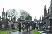 21 November 2019; Uachtarán Cumann Lúthchleas Gael John Horan, centre, with Monsignor Eoin Thynne, left, and Ard Stiúrthóir of the GAA Tom Ryan at the unveiling of headstones on the graves of Jerome O’Leary, 10, Michael Feery, 40, and Patrick O’Dowd, 57, who are among the 14 people killed at Croke Park on this day 99 years ago on what became known as Bloody Sunday. These unveilings complete the list of seven Bloody Sunday victims who until recently had all been buried in unmarked graves at different locations at Glasnevin Cemetery in Dublin. Photo by Matt Browne/Sportsfile