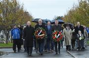 21 November 2019; Uachtarán Cumann Lúthchleas Gael John Horan, centre, Monsignor Eoin Thynne, left, and Ard Stiúrthóir of the GAA Tom Ryan with relatives of the deceased at the unveiling of headstones on the graves of Jerome O’Leary, 10, Michael Feery, 40, and Patrick O’Dowd, 57, who are among the 14 people killed at Croke Park on this day 99 years ago on what became known as Bloody Sunday. These unveilings complete the list of seven Bloody Sunday victims who until recently had all been buried in unmarked graves at different locations at Glasnevin Cemetery in Dublin. Photo by Matt Browne/Sportsfile