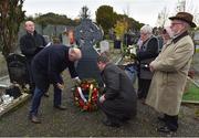 21 November 2019; Uachtarán Cumann Lúthchleas Gael John Horan, left, and Ard Stiúrthóir of the GAA Tom Ryan place a wreath at the headstone of Patrick O’Dowd during the unveiling of headstones on the graves of Jerome O’Leary, 10, Michael Feery, 40, and Patrick O’Dowd, 57, who are among the 14 people killed at Croke Park on this day 99 years ago on what became known as Bloody Sunday. These unveilings complete the list of seven Bloody Sunday victims who until recently had all been buried in unmarked graves at different locations at Glasnevin Cemetery in Dublin. Photo by Matt Browne/Sportsfile