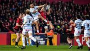 23 November 2019; Simon Zebo of Racing 92 and Andrew Conway of Munster contest a high ball during the Heineken Champions Cup Pool 4 Round 2 match between Munster and Racing 92 at Thomond Park in Limerick. Photo by Brendan Moran/Sportsfile