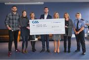 29 November 2019; GAA representative Kevin Sexton, left, and member of An Garda Síochána Jen Keegan, right, present a cheque to, from left, Deidre Walsh of Western Alzheimers, Liz Yates of the Marie Keating Foundation, Donal Kitt of Enable Ireland and Ciara Carty and Elaine Fleming of Focus Ireland during the GAA Charities Cheque Handover at Canal Café in Croke Park, Dublin. Photo by Harry Murphy/Sportsfile