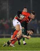 21 December 2019; Liam Coombes of Munster evades the tackle of Caolin Blade of Connacht during the Guinness PRO14 Round 8 match between Connacht and Munster at The Sportsground in Galway. Photo by Seb Daly/Sportsfile