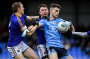 11 January 2020; Andy Foley of Dublin is tackled by Patrick Fox, left, and Michael Quinn of Longford during the O'Byrne Cup Semi-Final match between Longford and Dublin at Glennon Brothers Pearse Park in Longford. Photo by Ray McManus/Sportsfile