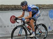 23 June 2013; Philip Deignan, United Healthcare, in action following a crash during the Elite Men's National Road Race Championships. Carlingford, Co. Louth. Picture credit: Stephen McMahon / SPORTSFILE