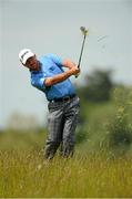 26 June 2013; Graeme McDowell plays from the rough on the 2nd hole during the Irish Open Golf Championship 2013 Pro Am. Carton House, Maynooth, Co. Kildare. Picture credit: David Maher / SPORTSFILE