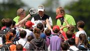 26 June 2013; Darren Clarke signs autographs as he makes his way to the 3rd tee during the Irish Open Golf Championship 2013 Pro Am. Carton House, Maynooth, Co. Kildare. Picture credit: David Maher / SPORTSFILE