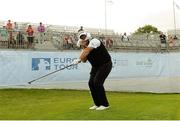 26 June 2013; Darren Clarke watches his blindfolded pitch on the 17th green go just past the hole during the Irish Open Golf Championship 2013 Pro Am. Carton House, Maynooth, Co. Kildare. Picture credit: Matt Browne / SPORTSFILE