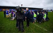 11 January 2020; Longford manager Padraic Davis is interviewed, as the players warm down, after the O'Byrne Cup Semi-Final match between Longford and Dublin at Glennon Brothers Pearse Park in Longford. Photo by Ray McManus/Sportsfile