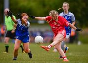 22 June 2019; Emma Conroy of Tyrone in action against Megan Byrne of Monaghan during the Ladies Football All-Ireland U14 Gold Final 2019 match between Monaghan and Tyrone at St Aidan's GAA Club in Templeport, Cavan. Photo by Ray McManus/Sportsfile