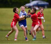 22 June 2019; Leah Connolly of Monaghan is tackled by Poppy Fox, left, and Roisin Colton of Tyrone during the Ladies Football All-Ireland U14 Gold Final 2019 match between Monaghan and Tyrone at St Aidan's GAA Club in Templeport, Cavan. Photo by Ray McManus/Sportsfile