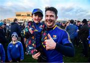 18 January 2020; Longford captain Michael Quinn celebrates with supporter Fionn Coy following the 2020 O'Byrne Cup Final between Offaly and Longford at Bord na Mona O'Connor Park in Tullamore, Offaly. Photo by David Fitzgerald/Sportsfile