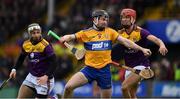 2 February 2020; Tony Kelly of Clare in action against Paul Morris and Aidan Rochford of Wexford, left, during the Allianz Hurling League Division 1 Group B Round 2 match between Wexford and Clare at Chadwicks Wexford Park in Wexford. Photo by Ray McManus/Sportsfile