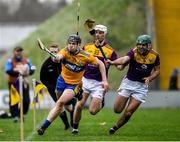 2 February 2020; Tony Kelly of Clare narrowly fails to stop the sliothar from going out over the sideline under pressure from Wexford players Conor Dunbar, 22, and Shaun Murphy during the Allianz Hurling League Division 1 Group B Round 2 match between Wexford and Clare at Chadwicks Wexford Park in Wexford. Photo by Ray McManus/Sportsfile