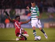 21 February 2020; Graham Burke of Shamrock Rovers in action against Henry Ochieng of Cork City during the SSE Airtricity League Premier Division match between Shamrock Rovers and Cork City at Tallaght Stadium in Dublin. Photo by Stephen McCarthy/Sportsfile