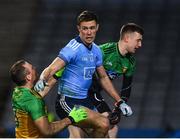 22 February 2020; Paul Mannion of Dublin reacts after scoring his side's first goal despite the attention of Neil McGee of Donegal during the Allianz Football League Division 1 Round 4 match between Dublin and Donegal at Croke Park in Dublin. Photo by Sam Barnes/Sportsfile