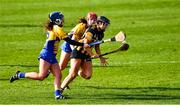 23 February 2020; Aoife Doyle of Kilkenny is tackled by Ciara Grogan and Alannah Ryan of Clare during the Littlewoods Ireland Camogie League Division 1 match between Kilkenny and Clare at UPMC Nowlan Park in Kilkenny. Photo by Ray McManus/Sportsfile