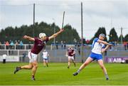 23 February 2020; Stephen Bennett of Waterford scores a point under pressure from Gearoid McInerney of Galway during the Allianz Hurling League Division 1 Group A Round 4 match between Waterford and Galway at Walsh Park in Waterford. Photo by Seb Daly/Sportsfile