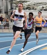 1 March 2020; John Travers of Donore Harriers, Dublin, on his way to winning the Senior Men's 3000m event, ahead of Hiko Haso Tonosa of Dundrum South Dublin AC, who finished second, centre, and Darragh McElhinney of UCD AC, Dublin, during Day Two of the Irish Life Health National Senior Indoor Athletics Championships at the National Indoor Arena in Abbotstown in Dublin. Photo by Sam Barnes/Sportsfile