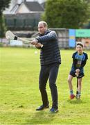 5 March 2020; Prince William, Duke of Cambridge makes an attempt to hit a sliothar with a hurley during an engagement at Salthill Knocknacarra GAA Club in Galway during day three of his visit to Ireland. Photo by Sam Barnes/Sportsfile