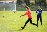 5 March 2020; Catherine, Duchess of Cambridge makes an attempt at a hand pass during an engagement at Salthill Knocknacarra GAA Club in Galway during day three of her visit to Ireland. Photo by Sam Barnes/Sportsfile