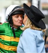 11 March 2020; Jockey Barry Geraghty kisses Noreen McManus after winning the RSA Insurance Novices' Chase on Day Two of the Cheltenham Racing Festival at Prestbury Park in Cheltenham, England. Photo by Harry Murphy/Sportsfile