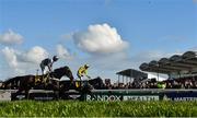 13 March 2020; Jockey Paul Townend on Al Boum Photo, on the rails, celebrates after winning the Magners Cheltenham Gold Cup Chase ahead of Santini, with Nico de Boinville up, on Day Four of the Cheltenham Racing Festival at Prestbury Park in Cheltenham, England. Photo by David Fitzgerald/Sportsfile