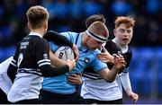 26 February 2020; Tom Stewart of St Michael's College in action against Newbridge College players, from left, Ciarán Mangan, Ronan McGroary, and Ruairí Munnelly during the Bank of Ireland Leinster Schools Junior Cup Second Round match between St Michael’s College and Newbridge College at Energia Park in Dublin. Photo by Piaras Ó Mídheach/Sportsfile