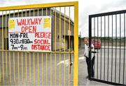 8 June 2020; Tadhg Donavan, Chairman of Buttevant GAA Club, opens the gates to walkers at Buttevant GAA club in Buttevant, Cork. Following restrictions imposed by the Irish Government and the Health Service Executive in an effort to contain the spread of the Coronavirus (COVID-19) pandemic, all GAA facilities closed on March 25. Following the easing of restrictions, walkways in GAA clubs opened to members of the public for exercising on Monday, June 8, with pitches due to fully open to club members for training on June 29, and club matches provisionally due to start on July 31 with intercounty matches due to to take place no sooner that October 17. Photo by Eóin Noonan/Sportsfile