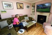 8 June 2020; Race horse trainer Jessica Harrington watches horse racing from Naas racecourse on television from her home at Commonstown Stables in Moone, Kildare, under public health advice from the Health Service Executive. Horse racing has been allowed to resume on June 8 under the Irish Government’s Roadmap for Reopening of Society and Business following strict protocols of social distancing and hand sanitisation among other measures allowing it to return in a phased manner, having been suspended from March 25 due to the Government's efforts to contain the spread of the Coronavirus (COVID-19) pandemic. Photo by Ramsey Cardy/Sportsfile