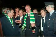 17 November 1993; Taoiseach Albert Reynolds T.D. welcomes Republic of Ireland manager Jack Charlton at Dublin Airport on the teams return from their 1-1 draw with Northern Ireland at Windsor Park in Belfast. Photo by Ray McManus/Sportsfile