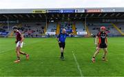 17 July 2020; Team captains Jack O'Connor of St Martin's, left, and Kevin Sheridan of Oulart the Ballagh after the coin toss with referee Justin Heffernan prior to the Wexford County Senior Hurling Championship Group A Round 1 match between Oulart the Ballagh and St Martin's at Chadwicks Wexford Park in Wexford. Competitive GAA matches have been approved to return following the guidelines of Phase 3 of the Irish Government’s Roadmap for Reopening of Society and Business and protocols set down by the GAA governing authorities. With games having been suspended since March, competitive games can take place with updated protocols including a limit of 200 individuals at any one outdoor event, including players, officials and a limited number of spectators, with social distancing, hand sanitisation and face masks being worn by those in attendance among other measures in an effort to contain the spread of the Coronavirus (COVID-19) pandemic. Photo by Brendan Moran/Sportsfile