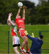 17 July 2020; Eoin D'Arcy of Tinahely on his way to scoring the first goal, past goalkeeper Dan Troy and defender Blaine Harmon of Kiltegan during the Wicklow County Senior Football Championship Round 1 match between Tinahely and Kiltegan at Baltinglass GAA Club in Baltinglass, Wicklow. Competitive GAA matches have been approved to return following the guidelines of Phase 3 of the Irish Government’s Roadmap for Reopening of Society and Business and protocols set down by the GAA governing authorities. With games having been suspended since March, competitive games can take place with updated protocols including a limit of 200 individuals at any one outdoor event, including players, officials and a limited number of spectators, with social distancing, hand sanitisation and face masks being worn by those in attendance among other measures in an effort to contain the spread of the Coronavirus (COVID-19) pandemic. Photo by Matt Browne/Sportsfile