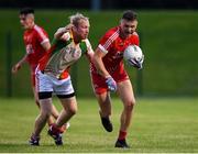 17 July 2020; Eoghan Byrne of Tinahely in action against Bryan Cullen of Kiltegan during the Wicklow County Senior Football Championship Round 1 match between Tinahely and Kiltegan at Baltinglass GAA Club in Baltinglass, Wicklow. Competitive GAA matches have been approved to return following the guidelines of Phase 3 of the Irish Government’s Roadmap for Reopening of Society and Business and protocols set down by the GAA governing authorities. With games having been suspended since March, competitive games can take place with updated protocols including a limit of 200 individuals at any one outdoor event, including players, officials and a limited number of spectators, with social distancing, hand sanitisation and face masks being worn by those in attendance among other measures in an effort to contain the spread of the Coronavirus (COVID-19) pandemic. Photo by Matt Browne/Sportsfile