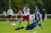 18 July 2020; Liam Caffrey of Spartak Dynamo FC is tackled by Dylan Garrett of St. Mochta's FC during the Leinster Senior League Division 3A match between St. Mochta's FC and Spartak Dynamo FC at Porterstown Park in Dublin. Photo by Ramsey Cardy/Sportsfile