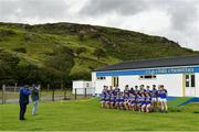 18 July 2020; Kilcar players stand for a team photograph prior to the Donegal County Divisional League Division 1 Section B match between Kilcar and Killybegs at Towney Park in Kilcar, Donegal. Competitive GAA matches have been approved to return following the guidelines of Phase 3 of the Irish Government’s Roadmap for Reopening of Society and Business and protocols set down by the GAA governing authorities. With games having been suspended since March, competitive games can take place with updated protocols including a limit of 200 individuals at any one outdoor event, including players, officials and a limited number of spectators, with social distancing, hand sanitisation and face masks being worn by those in attendance among other measures in an effort to contain the spread of the Coronavirus (COVID-19) pandemic. Photo by Seb Daly/Sportsfile