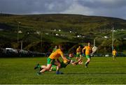18 July 2020; Danny Walsh of Ardara in action against David O'Donnell of Naomh Columba during the Donegal County Divisional League Division 1 Section B match between Naomh Columba and Ardara at Páirc na nGael in Glencolumbkille, Donegal. Competitive GAA matches have been approved to return following the guidelines of Phase 3 of the Irish Government’s Roadmap for Reopening of Society and Business and protocols set down by the GAA governing authorities. With games having been suspended since March, competitive games can take place with updated protocols including a limit of 200 individuals at any one outdoor event, including players, officials and a limited number of spectators, with social distancing, hand sanitisation and face masks being worn by those in attendance among other measures in an effort to contain the spread of the Coronavirus (COVID-19) pandemic. Photo by Seb Daly/Sportsfile