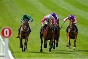 19 July 2020; Aloha Star, centre, with Chris Hayes up, races alongside eventual second place Frenetic, left, with Colin Keane up, on their way to winning the Airlie Stud Stakes at The Curragh Racecourse in Kildare. Racing remains behind closed doors to the public under guidelines of the Irish Government in an effort to contain the spread of the Coronavirus (COVID-19) pandemic. Photo by Seb Daly/Sportsfile
